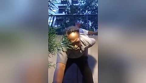 Black security guard is with a black guy in the office