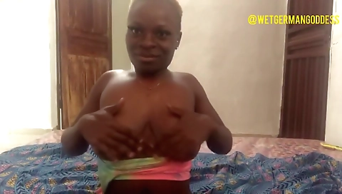 Ebony milf with huge natural tits shows off on cam