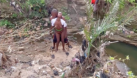 Ebony milf fucked in an outdoor stream by her boyfriend