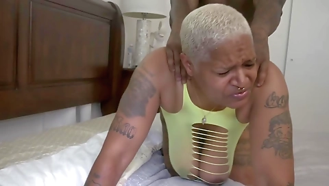 Big black chick gets a deep throat shot from a big white cock