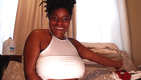 Ebony girl is wearing sexy lingerie in a solo video