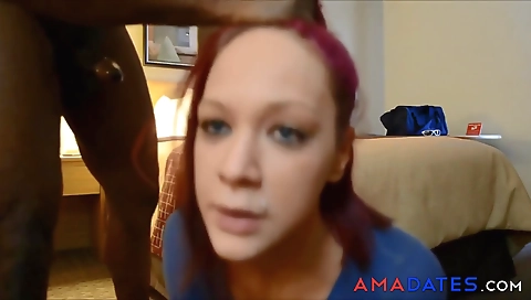 Big black cock makes this redhead fuck on the webcam