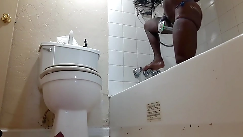 Big ass ebony woman is showing off her body in solo