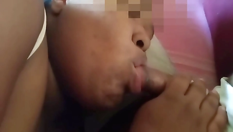 A hottie is giving her man a delicious blowjob and he is ready to cum